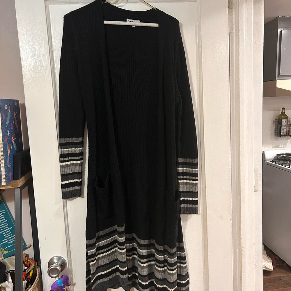 Long, black and grey sweater